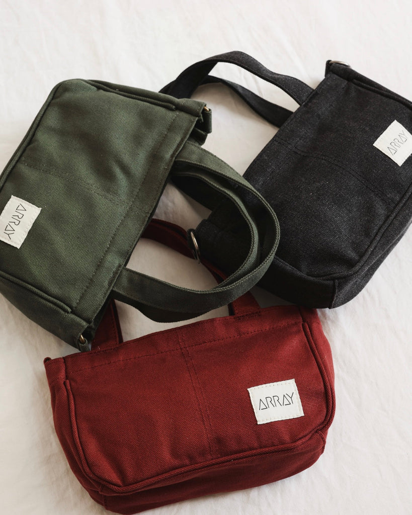 Small version of the bestselling totes, with six pockets.