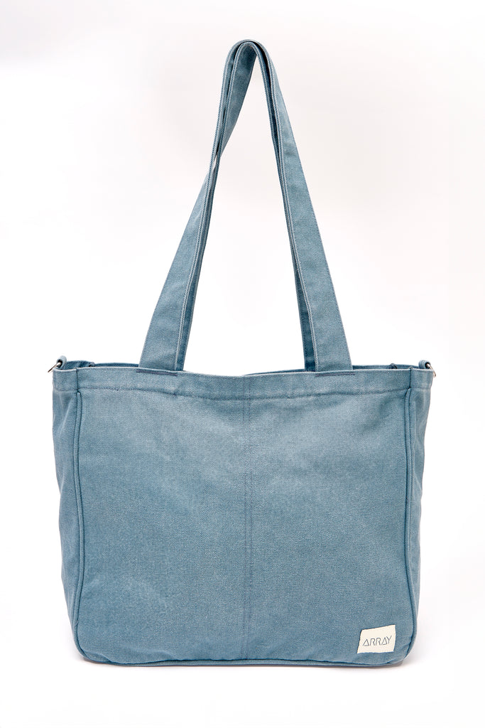 Larger version of the bestselling everyday zip top pocket tote, with six internal pockets, in a versatile and casual style. Large enough to fit a laptop, lunchbag or large water bottle, it makes the perfect bag for work or study, or the ultimate mumbag.