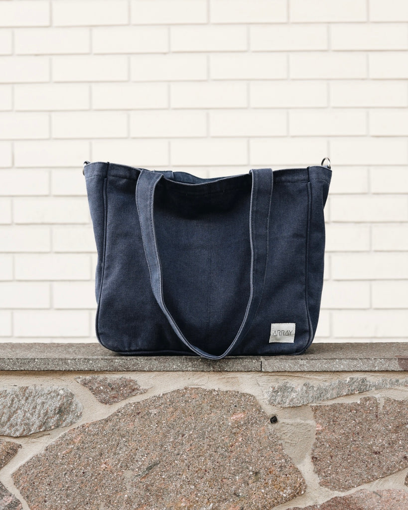 Everyday Zip Top tote bag with six internal pockets, in a versatile and casual style. Organise the chaos of everyday life. From baby bag, to work bag it is an everyday essential.