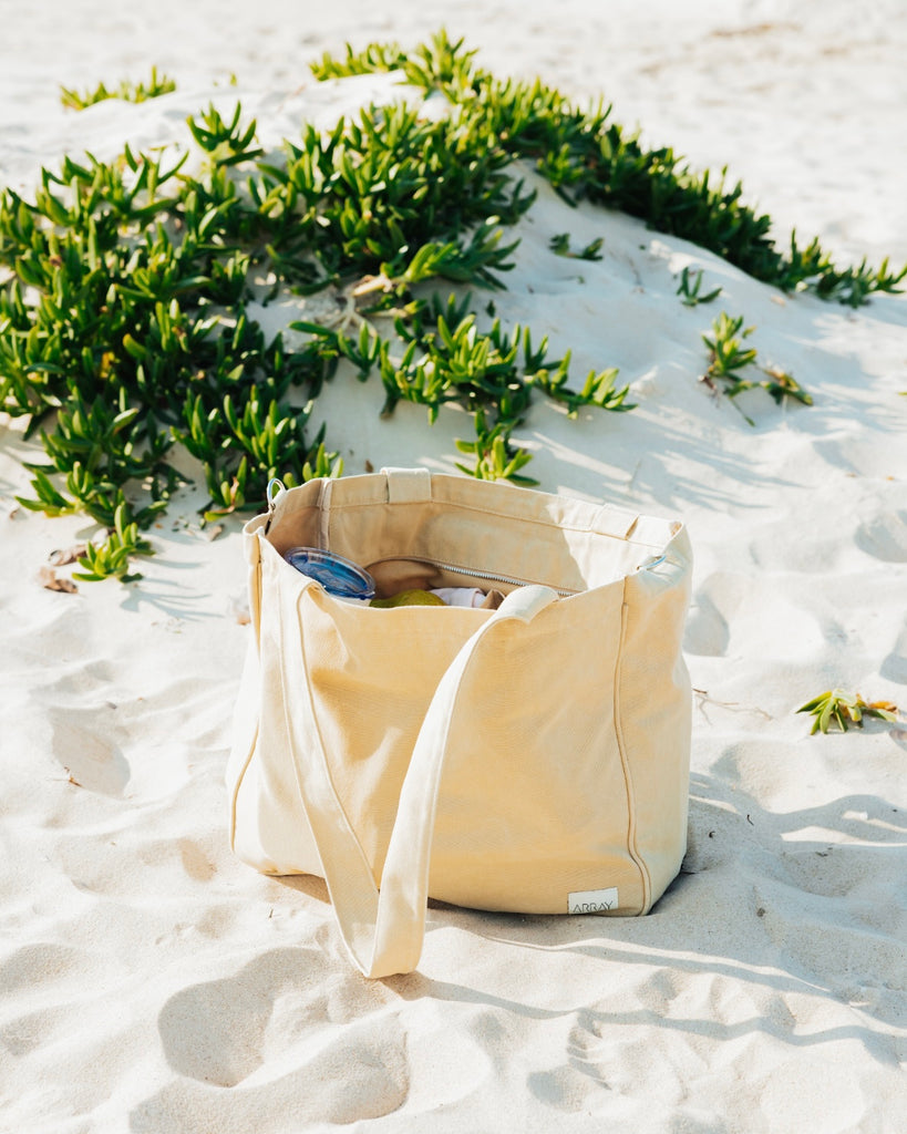 Larger version of the bestselling everyday zip top pocket tote, with six internal pockets, in a versatile and casual style. Large enough to fit a laptop, lunchbag or large water bottle, it makes the perfect bag for work or study, or the ultimate mumbag.