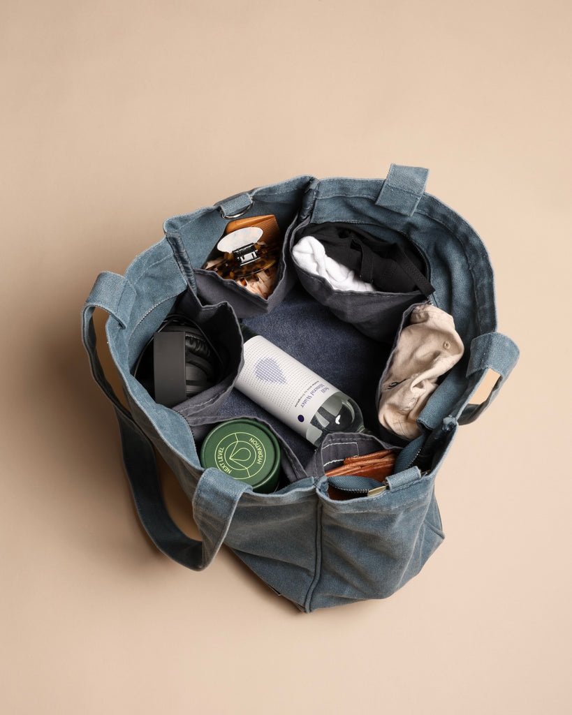 Everyday Zip Top tote bag with six internal pockets, in a versatile and casual style. Organise the chaos of everyday life. From baby bag, to work bag it is an everyday essential.