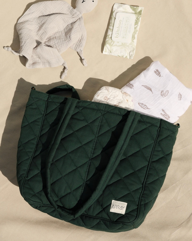 Quilted Everyday Pocket Tote bag with six internal pockets, in a versatile and casual style. Organise the chaos of everyday life. From baby bag, to work bag it is an everyday essential.