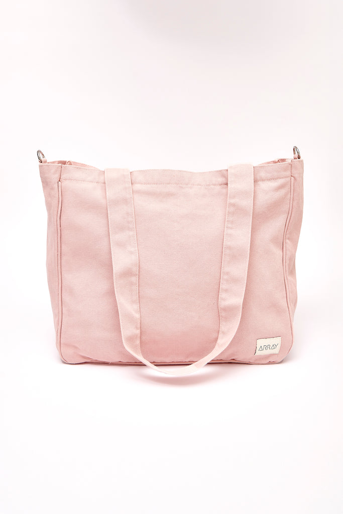 Larger version of the bestselling everyday zip top pocket tote, with six internal pockets, in a versatile and casual style. Large enough to fit a laptop, lunchbag or large water bottle, it makes the perfect bag for work or study, or the ultimate mumbag.