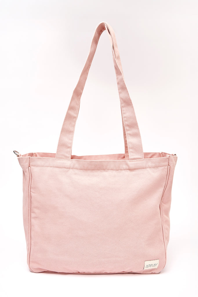 Larger version of the bestselling everyday zip top pocket tote, with six internal pockets, in a versatile and casual style. Large enough to fit a laptop, lunchbag or large water bottle, it makes the perfect bag for work or study, or the ultimate mumbag.