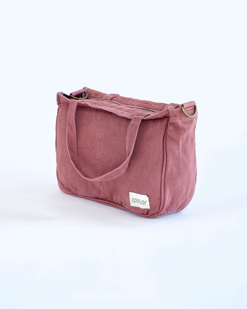 Smaller version of the bestselling everyday zip top pocket tote, with six internal pockets, in a versatile and casual style. The perfect bag for days when you don’t need to carry everything.