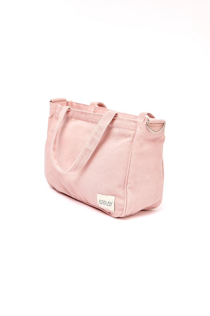 Smaller version of the bestselling everyday zip top pocket tote, with six internal pockets, in a versatile and casual style. The perfect bag for days when you don’t need to carry everything.