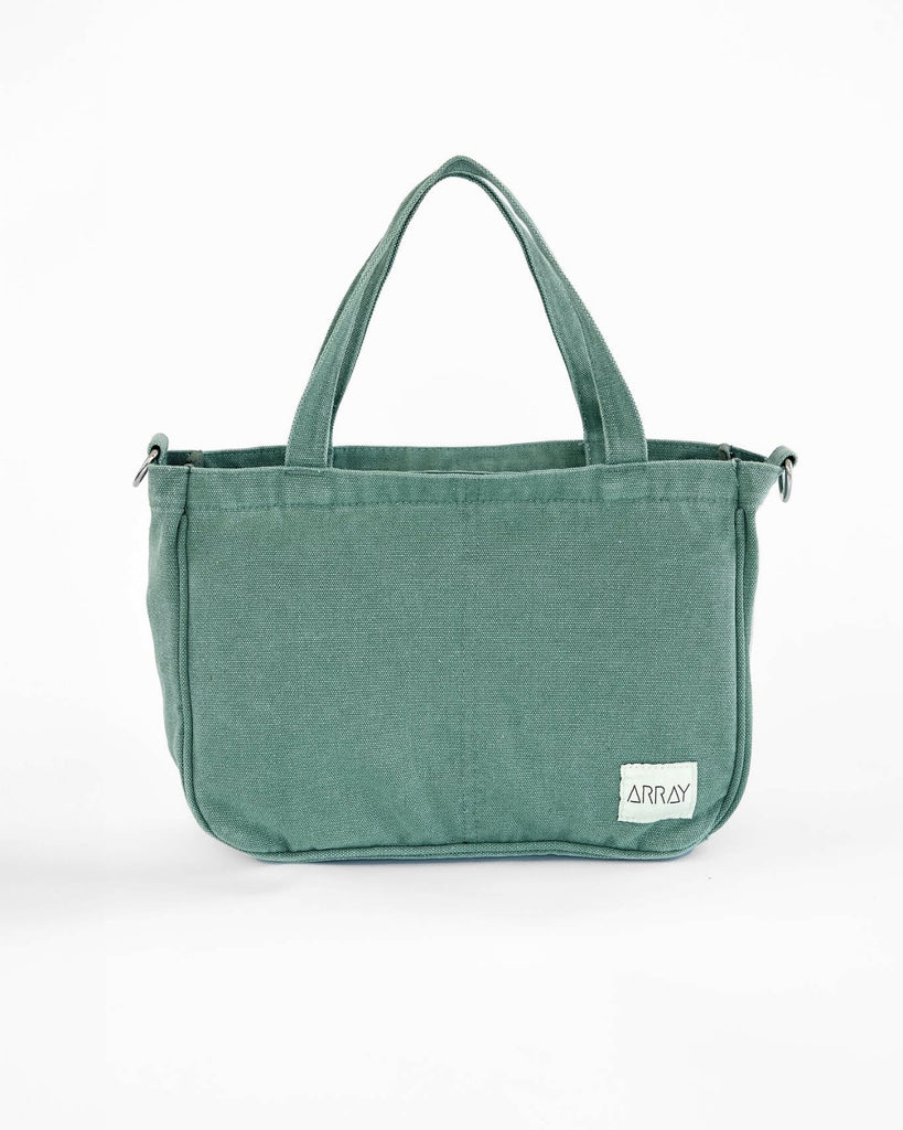 Smaller version of the bestselling everyday zip top pocket tote, with six internal pockets, in a versatile and casual style. The perfect bag for days when you don’t need to carry everything.