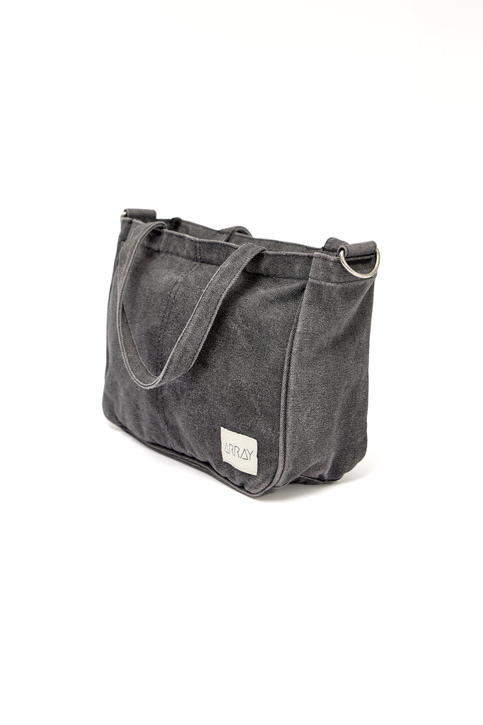 Smaller version of the bestselling everyday zip top pocket tote, with six internal pockets, in a versatile and casual style. The perfect bag for days when you don’t need to carry everything.