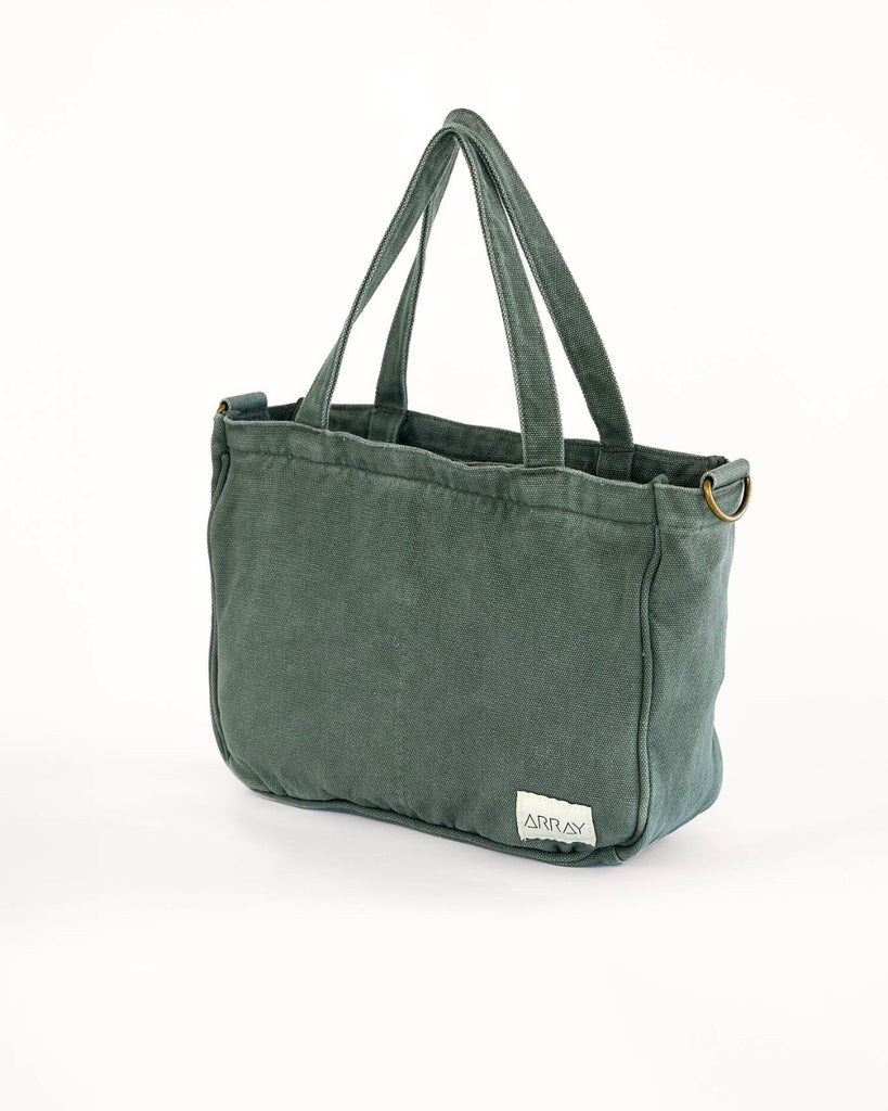 Smaller version of the bestselling everyday zip top pocket tote, with six internal pockets, in a versatile and casual style. The perfect bag for days when you don’t need to carry everything.