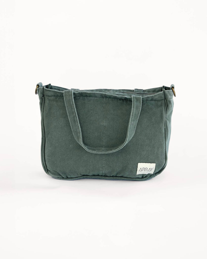 Smaller version of the bestselling everyday zip top pocket tote, with six internal pockets, in a versatile and casual style. The perfect bag for days when you don’t need to carry everything.