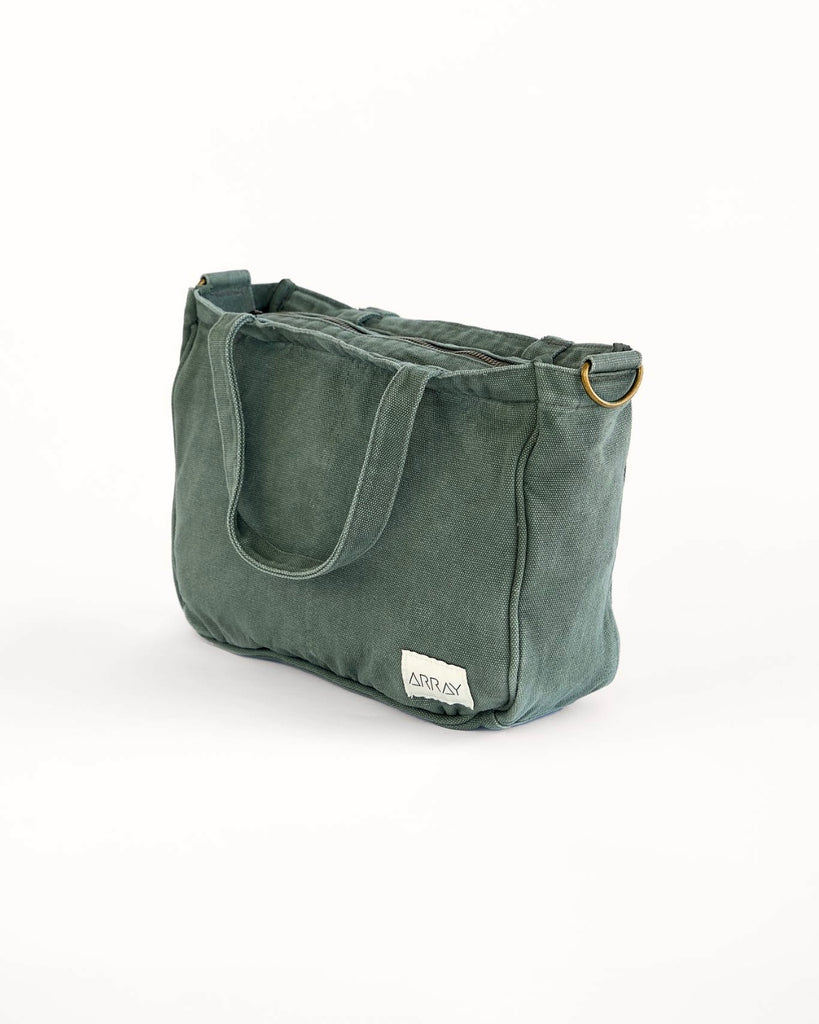 Smaller version of the bestselling everyday zip top pocket tote, with six internal pockets, in a versatile and casual style. The perfect bag for days when you don’t need to carry everything.