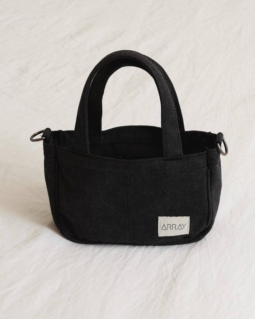 Small version of the bestselling totes, with six pockets.