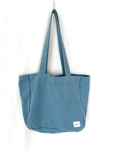 Large everyday bag with pockets in a unisex casual style, the pockets will help organise everything, perfect work bag, baby bag, or beach bag.